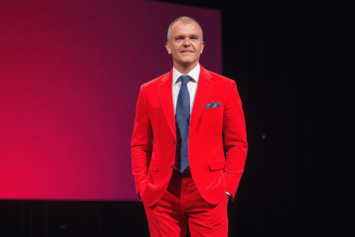 Man wearing bright red corduroy trousers